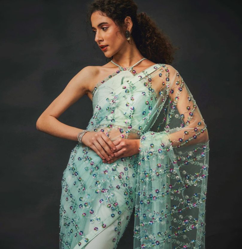 Halter High-neck Saree Blouse Design with Sleeveless Hand